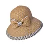 Chapeau de soleil en paille d'été à la mode avec nœud papillon pour femme
