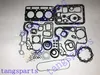 Kit guarnizioni motore D650 per parti del kit motore diesel del camion della spazzatura del caricatore del caricatore dell'escavatore Kubota