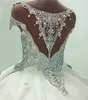 Crystal Ball Dresses Beade Sheer Neck Illusion Back Lace Applique Handmade Flowers Chapel Cap Sleeves Wedding Gown