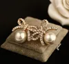 Mode utsökt zirkon rosett pärla örhängen högkvalitativa 18K guldpläterade hypoallergena kvinnliga söta flickörhängen