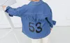 Jongens meisjes lange mouwen denim shirt blouses mode kids baby lente val knop omhoog katoenen cartoon glimlach kleding 1Y-5Y blauw