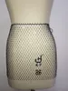 Grid Mesh Hollow Out Mini kjol för kvinnor Fishnet kjol Sexig strandklubb bikini grödor täcker kristallkedjan T2005078736782