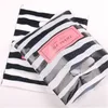 Nieuwe mode hele 100pcSlot 2025cm Blackwhite Stripe Shopping Cadeauverpakkingszakken met bedankjes5846380