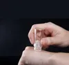 ديرما الرول Microneedling Dermaroller الذهب إبرة مجهرية 0.25mm0.5mm التيتانيوم إبرة مع جل زجاجة حب الشباب التجاعيد ساغي الجلد الكولاجين تجديد
