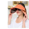 新しいファッション女性のUV保護クリップオンワイドブリムサンハットキャップの格納式のバイザーの抗紫外線屋外帽子調節可能なサイズ