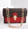 Elegant Designer Femmes Chain Messenger Sac Victoire Sac à bandoulière Véritable Protage en cuir Trotté