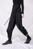 Personalizado nueva moda hombres y mujeres estilo Yamamoto diseño sentido ancho de banda pantalones casuales sueltos pantalones irregulares asimétricos