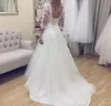 2019 Vintage rückenfreies A-Linien-Hochzeitskleid, transparentes V-Ausschnitt, halbe Ärmel, Brautkleid nach Maß in Übergröße