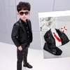 新しい子供のブレザージャケットレザークールな学校少年のコートスーツ良い品質ソフトパンク子供のファッションスタイルの衣装ブラックスーツ