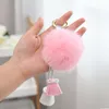 リアルウサギの毛皮の球キーホルダーキーホルダータッセルダイヤモンドの女性の女の子メタルPom Poms Plush Carキーリングホルダーファッションバッグチャームアクセサリー