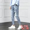 Новые мужские джинсы разорванные моды мужские разрушенные летние тонкие свободные корейские дыра джинсовые девять брюк