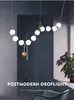 Lyxig enkelhet pärlhalsband Lobby ljuskrona belysning glas konst lightsliving rum modell showroom hall personlighet bubbla lampor