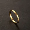 En gros 100 pcs/lot anneaux en acier inoxydable largeur 2mm bague de mariage bijoux pour hommes femmes argent/or/noir mode tout neuf
