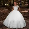 2020 Lovey Holy Lace Princess Flower Girl Dresses Ball Gown First Communion Klänningar för Flickor Ärmlös Tulle Toddler Pageant Klänningar