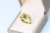 Wholesale-gold and green natural olivine springy design jewelry diamond rings lucky auspicious sacred attractive exaggerated circle