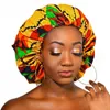 Bonne qualité Extra large Satin doublé Bonnets femmes motif africain imprimé tissu bonnets nuit sommeil chapeau dames Turban