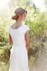 Nya eleganta landsspets bröllopsklänningar V Neck Cap Sleeve Modest Wedding Bridal Gowns Boho Beach Covered Button Cheap5462659