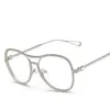 Vente en gros - Nouvelles belles montures de lunettes en strass femmes femmes lunettes de mode surdimensionnées avec lentilles claires or argent métal