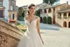 Abiti da sposa sexy in pizzo con spalle scoperte Applique a strati in tulle Giardino elegante abito da sposa economico Abiti da sposa Abiti da sposa