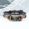 Pulsera de cuero tejido Aleación Cabeza de calavera Cuentas de madera Encantos Metal Joyería europea americana para mujeres Cadena de cuerda de mano antigua Brazalete envolvente para hombre