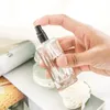 卸売5ml 10ml 20ml 30ml透明薄いガラススプレーボトルサンプルガラスバイアルポータ​​ブルミニ香水噴霧器ゴールドシルバーブラックキャップ