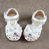 Weiß Rosa Baby Kleinkind Kleine Mädchen Säuglingsommer Bogen Prinzessin Kleid Sandalen Für Mädchen flache Hohl Sweet Leder Sandalen Schuhe