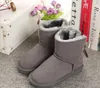 حار بيع أون لالأحذية والجلود والأحذية الثلوج القوس أزياء الأولاد والبنات الدافئة الثلوج في فصل الشتاء أحذية 5062 حجم 20-35