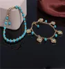 2 pièces/ensemble Unique vert Turqoise Howlite perle fleur pendentif couleur or chaîne cheville Souvenir cheville Bracelet pied bijoux