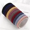 Nya 100pcs / Lot Women Girls Simple Basic Elastic Hair Bands Tie Gum Scrunchie Ponytailhållare Gummi Bands Mode Hårtillbehör