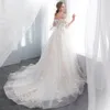 С плеча кружева линия платья элегантные вспышки с короткими рукавами тюль аппликация бисером развертки поезда свадебные свадебные платья CPS1003