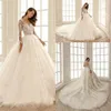 2020 Ball Gown Wedding Dresses Jewel Long Sleeves Lace Appliques Castle Bridal Gowns Custom Made Button Back Sweep Train Wedding Dress