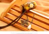 Vintage Carved Little Daisy Glass Wishing Bottle Necklace Leather Rope Pearl Butterfly Pendant Sweater Chain Female Fashion Simple2078825