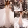 New Sexy Arabic Champagne Long Sleeves Mermaid Wedding Dresses Sheer Lace Appliques With Overskirts Detachable Train Plus Size Bridal Gowns