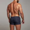 Nowe markowe szybkoschnące spodenki planszowe dla mężczyzn 2019 letnie dorywczo aktywne seksowne plażowe spodenki do pływania Man Fitness Gym