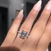 Uttalande ring 925 Sterling Silver Princess Cut Diamond Engagement Wedding Band Rings for Women Men Party Jewelry Gift4326182