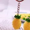 12st säckar charm ananas nyckelring simulering modeharts prydnad handväska hängande bil nyckelring för dekoration nyckelringar kedja