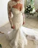 2024 New African Mermaid Wedding Dresses Sweetheart Lace Appliques Beading Long Sleeves Sweet Train Plus Size Custom Bridal Gowns 403