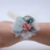 Bröllop Bridal Wrist Corsage Blommor Armband Armband Buketter Barn Hand Blommor Brudtärna Tjejer Konstgjorda Brud Blommor Bröllopsdekoration