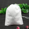 100 Pcs/lot sachets de thé 5.5x7 CM tissu vide sachets de thé parfumés avec chaîne guérir joint filtre pour herbe thé en vrac Bolsas