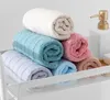 Asciugamano per il viso in tinta unita in tessuto di cotone semplice per la casa asciugamano assorbente per la casa spot regalo per la casa dell'hotel all'ingrosso asciugamani di stoffa per le mani 34 * 75 cm