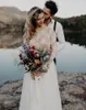 2019 Illusion Långärmad Land Bröllopsklänningar Boho Lovely Lace Jewel Keyhole Backless Tulle Beach Bröllopsklänning Brudklänningar