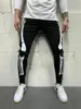 Lápiz de diseño pantalones para hombre blanco impreso Hole Negro Jeans estilo del ajuste delgado Pantalones Casual Male