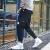 Januarysnow Brand Designer Men Fashion Sporty Pants For Hiphop Causal Runnings Pants High Street Jogger Pants New Pocket Trousers291q