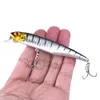 Hengjia 60PCS / Parti 4Colors Nya Minnow Fiske Lure Plast Hårdbete med 2 Treble Hook 4 # Hook Free Shipping