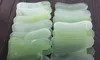 100 Uds. Piedra de Jade Natural de alta calidad tablero Gua Sha masaje de forma cuadrada masajeador de manos relajación cuidado de la salud herramienta de masaje Facial 7,5*5,5