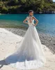 Sexy weiße Strand-böhmische Brautkleider, A-Linie, Spitze, Applikation, schiere Juwelenausschnitt, Illusionsrücken, Brautkleid, Brautkleider, Vestidos de Novia