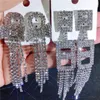 Mix tofs örhängen bling bling shine full crystal rhinestone claw chain diamant överdrivna örhängen boutique grossist smycken dhl