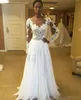 2020 Boho Wedding Dresses Bateau Sheer Neck Illusion Long Sleeves Lace Applique Backless Chiffon Floor Length Beach Wedding Bridal Gown