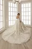 2020 Ball Gown Wedding Dresses Jewel Long Sleeves Lace Appliques Castle Bridal Gowns Custom Made Button Back Sweep Train Wedding Dress