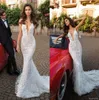 Elihav Sasson 2019 Meerjungfrau Hochzeitskleid mit Federn eintauchen V-Ausschnitt Spitze Brautkleider Roben de Mariée Illusion Custom Beach Brautkleider